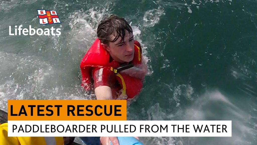 Intense video of a paddleboarder saved by his lifejacket and waterproof phone pouch