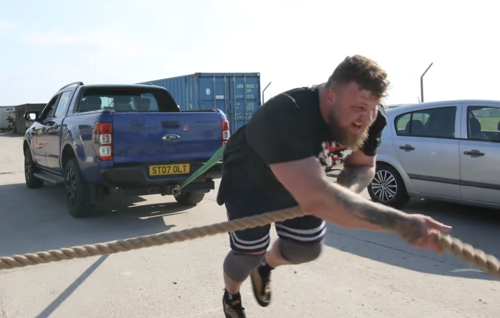 Watch the Reigning World’s Strongest Man Pull a 5,000-Pound Truck