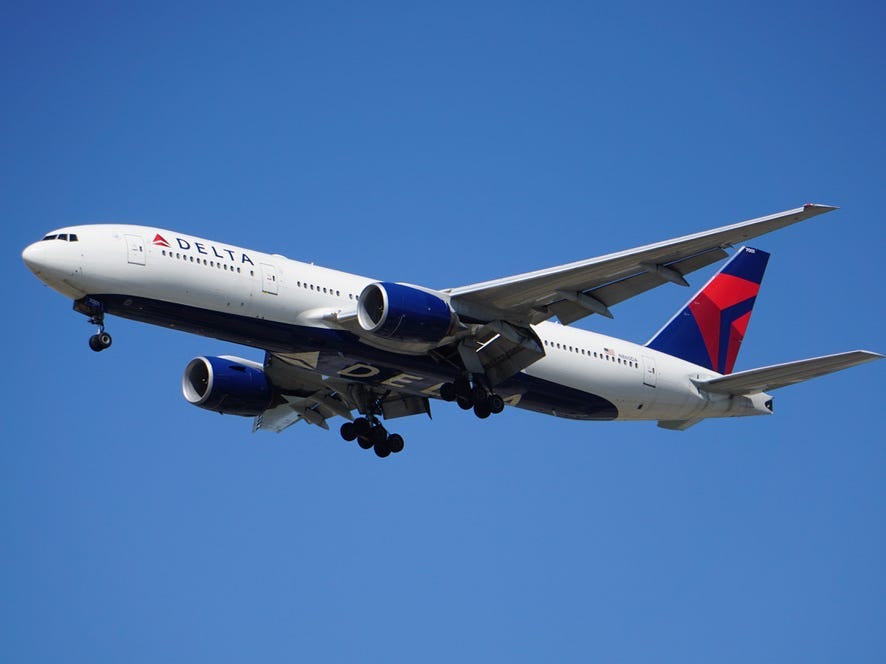 Delta says it will cancel about 100 flights a day in July and August to try to get ahead of a potential summer meltdown