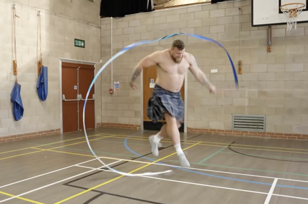 Watch the World’s Strongest Man Take on a Rhythmic Gymnastics Routine