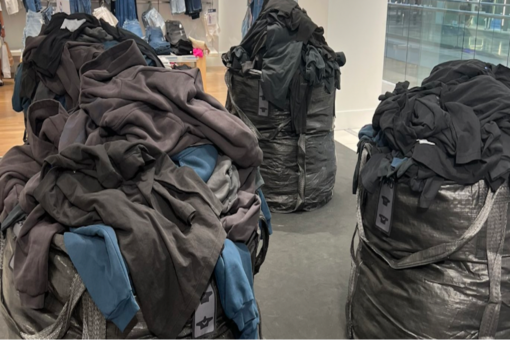 Gap, Kanye West Slammed for Displaying Clothing in Giant Garbage Bags Inside Stores
