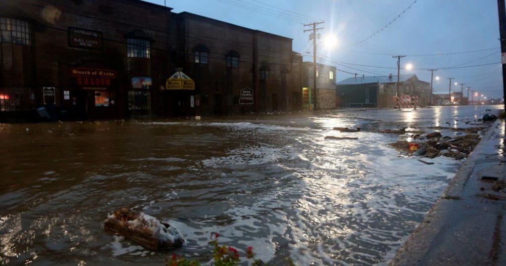 Storm battering western Alaska causes widespread flooding