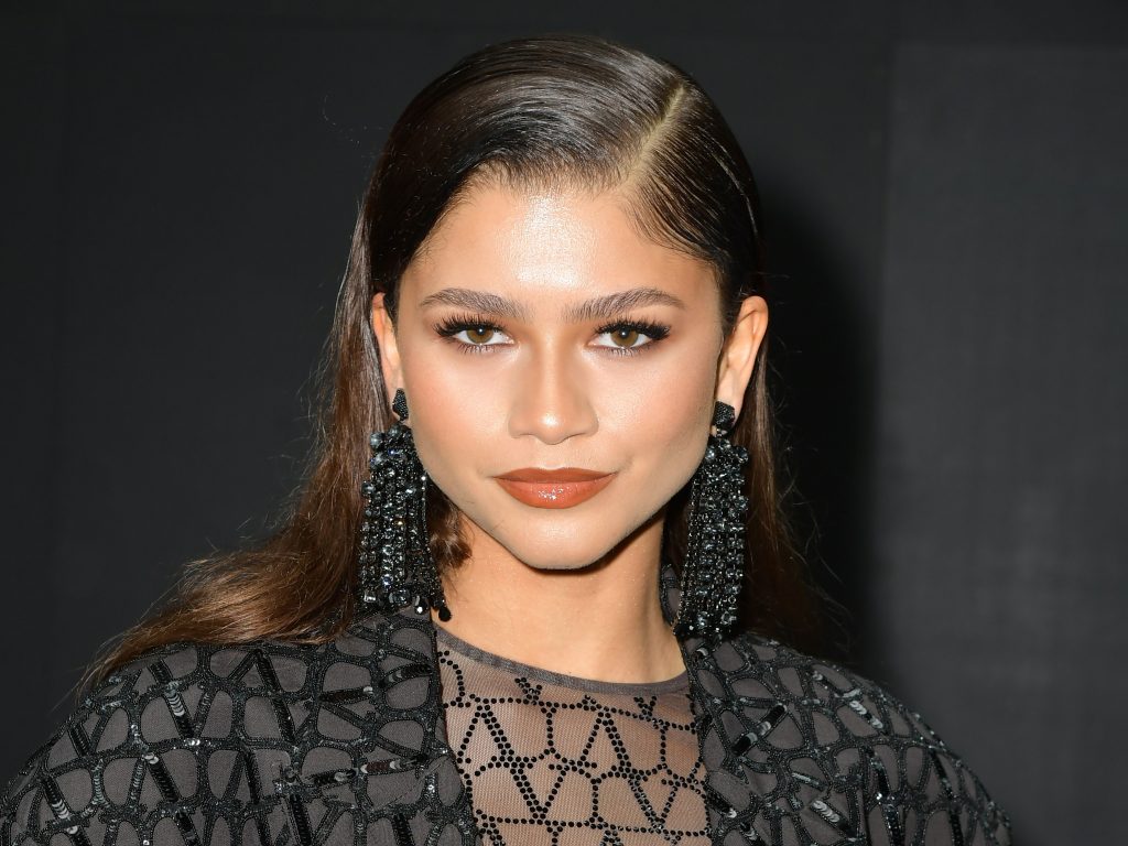 Zendaya Wore a Sheer Bodysuit with Short Shorts to Paris Fashion Week