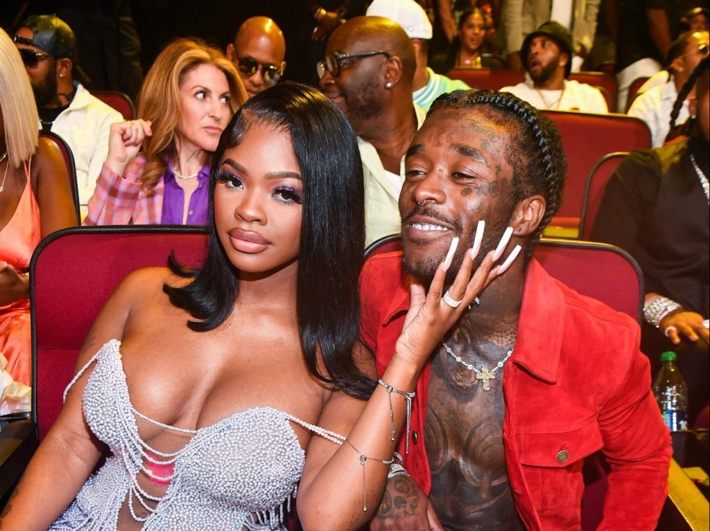 JT Defends “Black Rockstar” Lil Uzi Vert After Photo Of His Pierced Belly Button Trends, Says “Yes H*e That’s MY Man”