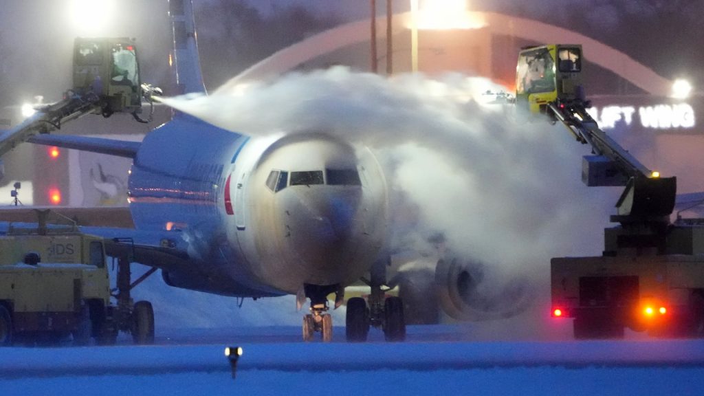 Airlines cancel 10,000 flights during severe winter storms and scramble to rebook holiday travelers