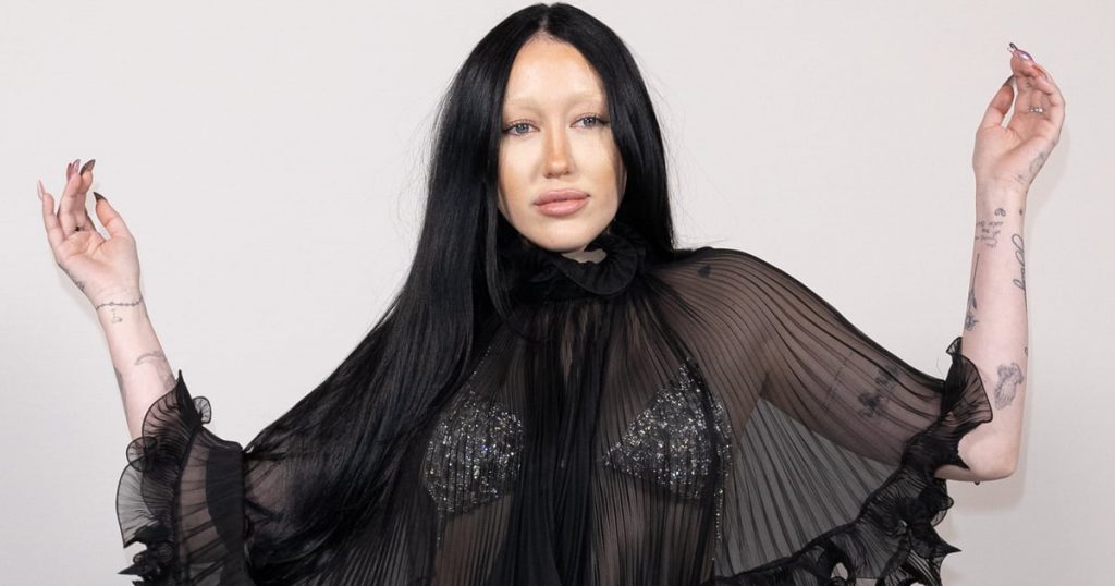 Noah Cyrus Glides Through Paris in a Sheer Dress and Embellished Bikini