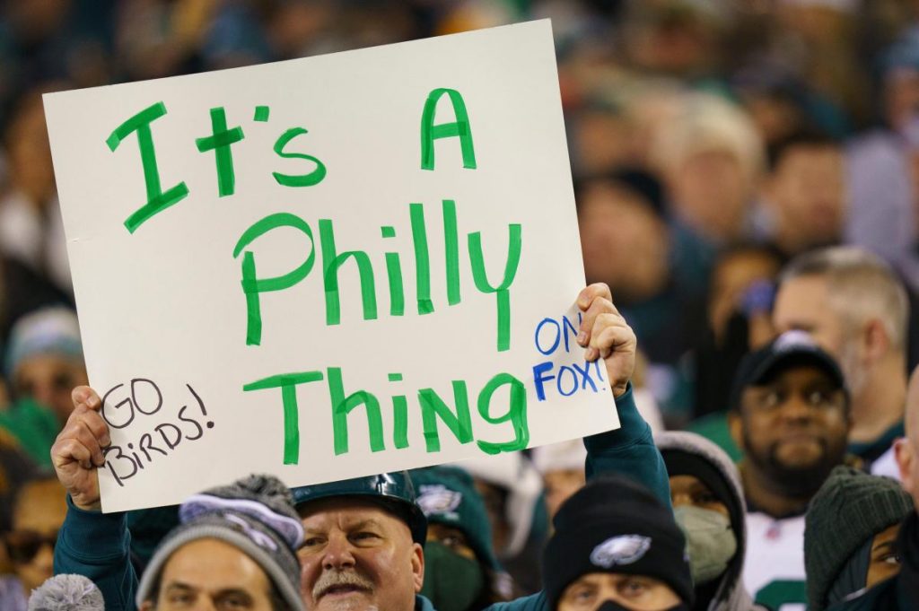 Eagles fans climb greased poles, crash through bus stop after Philly advances to Super Bowl