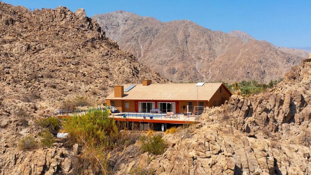 A Rock and a Cool Place: California Home Tucked Between Two Mountains Is Available for $3.5M