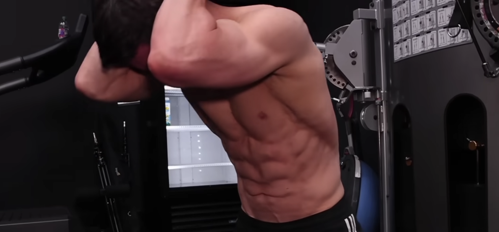 The 2 Moves That Will Help Shred Your Abs, According to This Top Trainer